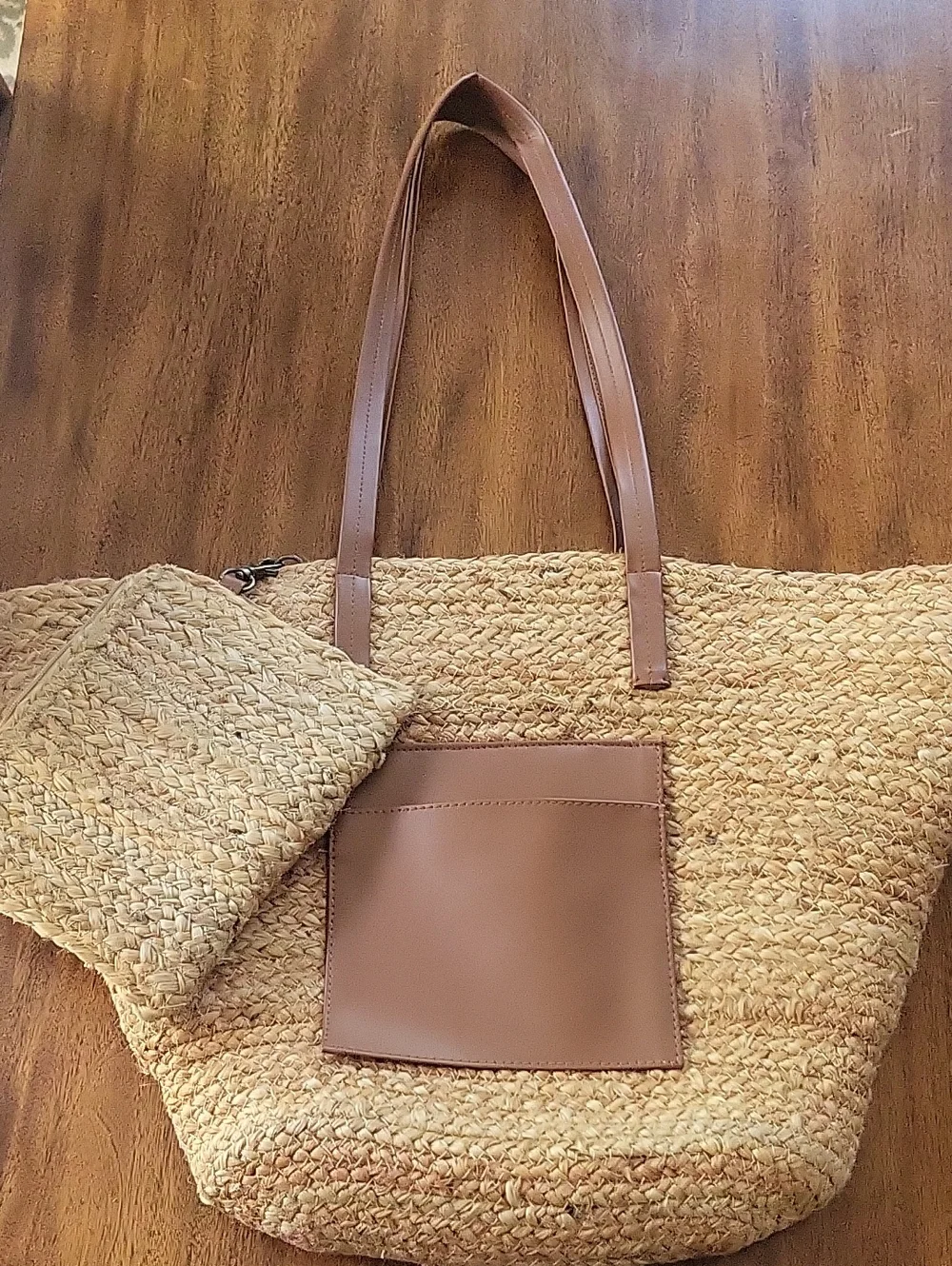 Woven Straw Tote Bag with Brown Trim And Detachable Tote.
